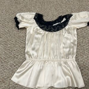Silk and lace peplum top.